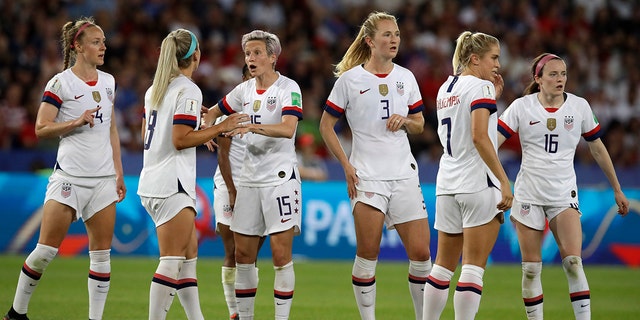 United States' Megan Rapinoe, third right, reacts with teammate Julie Ertz during the Women's World Cup quarterfinal soccer match between France and the United States at Parc des Princes in Paris, France, Friday, June 28, 2019. (AP Photo/Alessandra Tarantino)