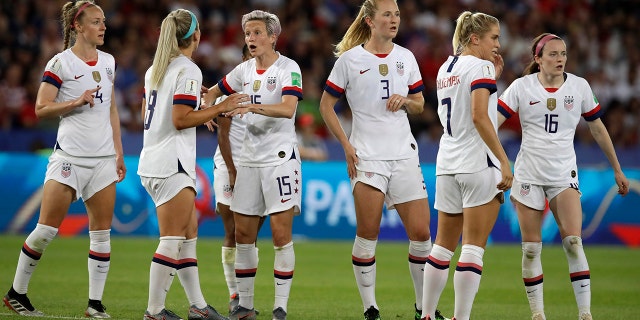 United States' Megan Rapinoe, third right, reacts with teammate Julie Ertz during the Women's World Cup quarterfinal soccer match between France and the United States at Parc des Princes in Paris, France, Friday, June 28, 2019. (AP Photo/Alessandra Tarantino)