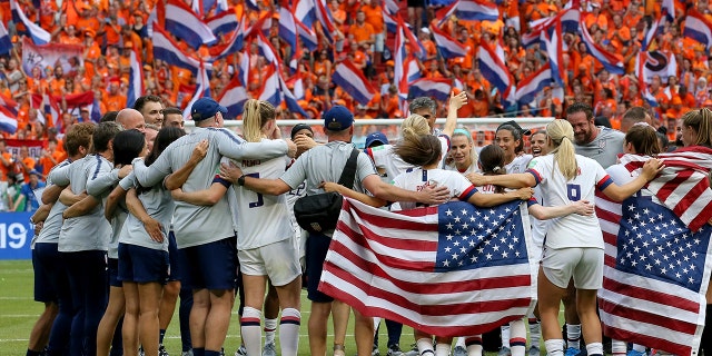 Members of the US team celebrate at the end of the Women's World Cup final soccer match between US and The Netherlands at the Stade de Lyon in Decines, outside Lyon, France, Sunday, July 7, 2019. US won 2:0. (AP Photo/David Vincent)