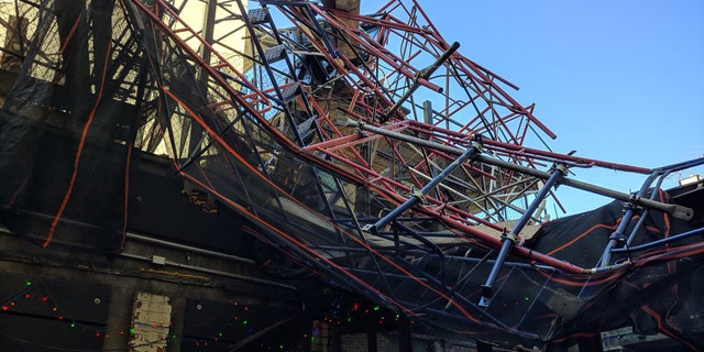 Fire officials said three people were hurt after scaffolding blew off the top of a 12-story building in Brooklyn. (New York City Fire Department)