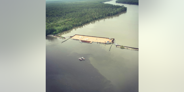 A 400-foot-long sunken barge in Bayou Chene is credited with sparing Assumption Parish from flooding caused by Hurricane Barry.