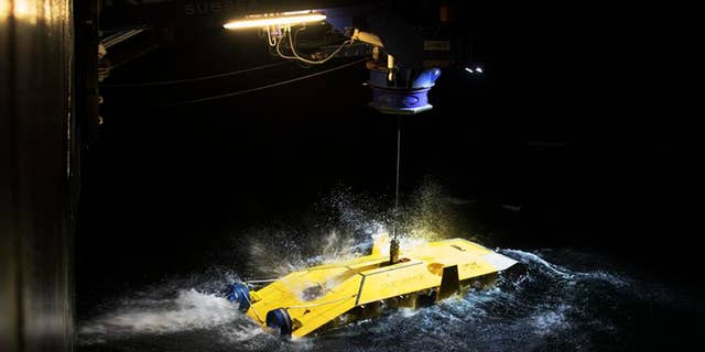 The undersea drone Surveyor Interceptor being deployed.