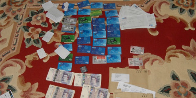 Credit and debit cards that were created in the victims' names and used by the gang members to steal their wages.