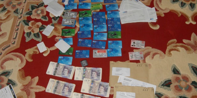 Credit and debit cards that were created in the victims' names and used by the gang members to steal their wages.