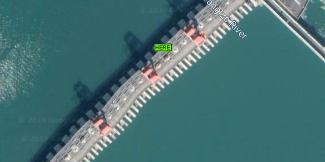 Google Maps image of the Three Gorges Dam, showing the evident warping on the structure.