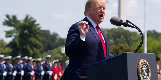President Donald Trump speaks during a full honors welcoming ceremony for Secretary of Defense Mark Esper at the Pentagon, Thursday, July 25, 2019, in Washington.