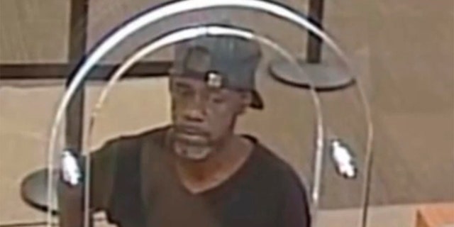 Michael Harrell, 54, robbed a U.S. Bank in Cleveland, Ohio, in July after handing a teller a note with his name on it, the FBI says. (Cleveland Division of the FBI via WJW)