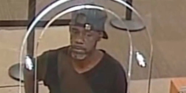 Michael Harrell, 54, robbed a U.S. Bank in Cleveland, Ohio, in July after handing a teller a note with his name on it, the FBI says. (Cleveland Division of the FBI via WJW)