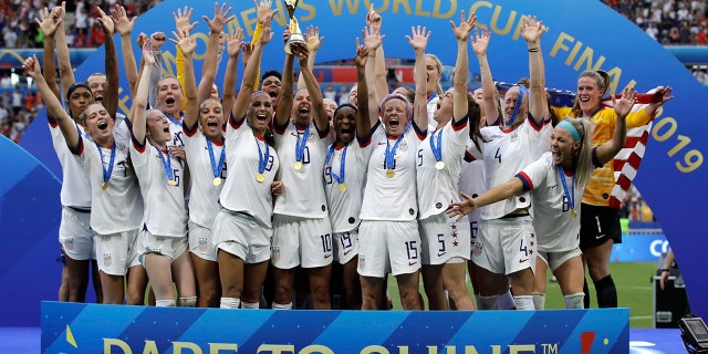 United States' team celebrates with the trophy after winning the Women's World Cup final soccer match between US and The Netherlands at the Stade de Lyon in Decines, outside Lyon, France. (AP Photo/Alessandra Tarantino, file)