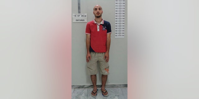 This undated handout photo provided by the Greek Police and released on Thursday, July 18 2019 shows 27-year-old Yiannis Paraskakis, accused of the brutal killing of American Suzanne Eaton. Greek authorities say they have identified a suspect accused of the brutal killing and rape of American scientist Suzanne Eaton. Paraskakis has been charged with the rape and murder of Eaton, 59, who disappeared on July 2 while attending a conference near Chania and whose body was found six days later in an abandoned underground storage site used during World War II. (Greek Police via AP)
