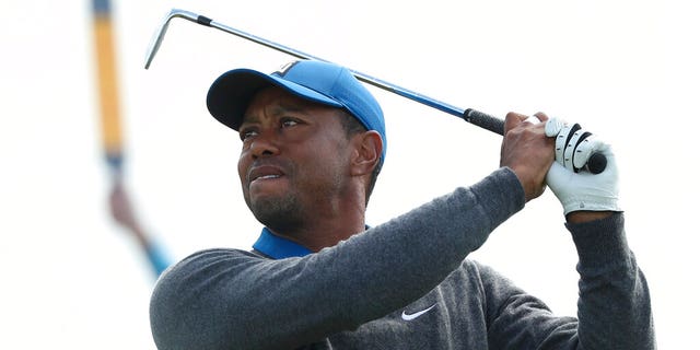 Tiger Woods hits his shot from the 3rd tee during the first round of the British Open Golf Championships at Royal Portrush in Northern Ireland, Thursday, July 18, 2019.(AP Photo/Jon Super)