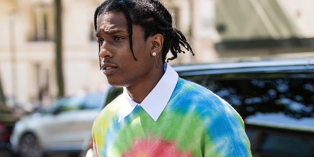 PARIS, FRANCE - JUNE 22: ASAP Rocky is seen wearing batik tshirt outside Loewe during Paris Fashion Week - Menswear Spring/Summer 2020 on June 22, 2019 in Paris, France. (Photo by Christian Vierig/Getty Images)