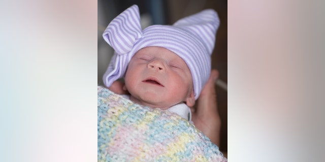 The baby girl, who has not been identified, was born in June and is "doing great."