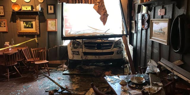 A white SUV crashed into a Cracker Barrel in Knoxville, Tenn., on Tuesday, damaging the chain’s dining room and window.