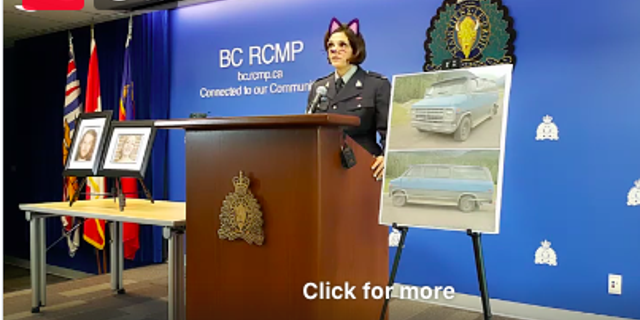 A sergeant with the Royal Canadian Mounted Police addresses reporters Friday about a double homicide that occurred in British Columbia. A cat filter mistakenly activated during a live stream of the sergeant's presentation.