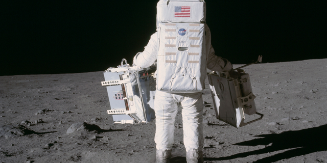 Astronaut Edwin (Buzz) Aldrin deploys two scientific experiments on the surface of the moon during Apollo 11.