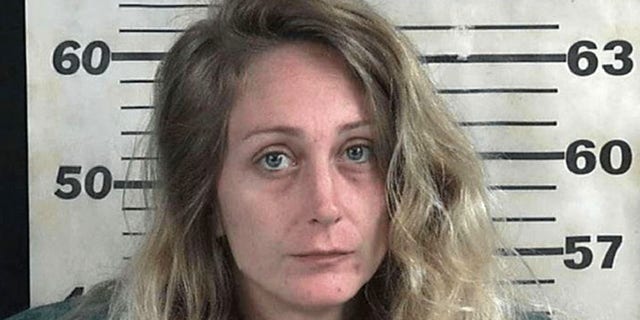Mugshot for Erica Cole, 31.