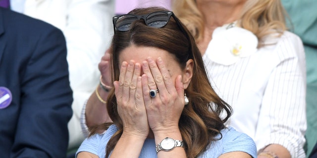 LONDON, ENGLAND - JULY 14: Catherine, Duchess of Cambridge in the Royal Box on the center court at the men's finals day of the Wimbledon Tennis Championships at the All England Lawn Tennis and Croquet Club on July 14, 2019 in London, England . 