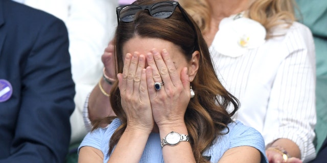 LONDON, ENGLAND - JULY 14: Catherine, Duchess of Cambridge in the Royal Box on the center court at the men's finals day of the Wimbledon Tennis Championships at the All England Lawn Tennis and Croquet Club on July 14, 2019 in London, England . 