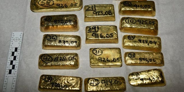 Five million dollars’ worth of gold bars, partially pictured here, have been seized at London’s Heathrow Airport by law enforcement officials investigating a South American drug cartel.