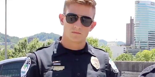Officer Derrick White, pictured, has become something of an overnight social media sensation.