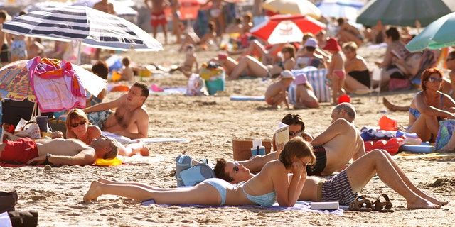 Teen Beach Voyeur - French beaches going PG as women eschew topless tanning, report claims
