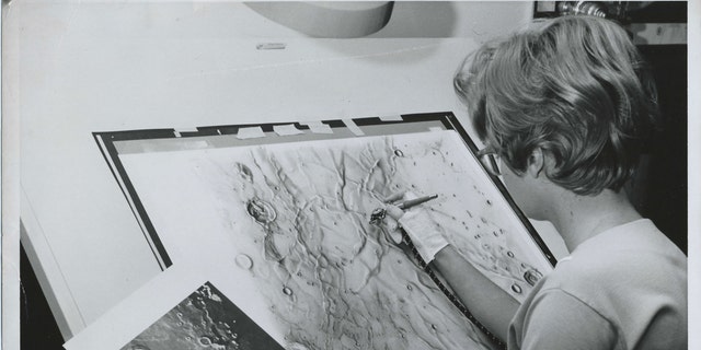 Photo of Patricia Bridges, one of the artists who created Lunar Charts at the Airbrush at the Aeronautical Information and Charts Center (ACIC) hosted at the Lowell Observatory.