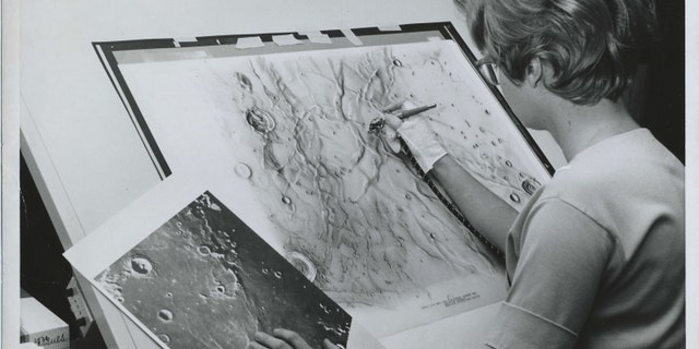 Photo of Patricia Bridges, one of the artists who created Lunar Charts at the Airbrush at the Aeronautical Information and Charts Center (ACIC) hosted at the Lowell Observatory.