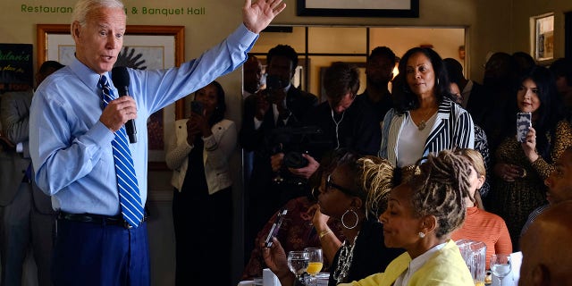 Democratic presidential candidate former Vice President Joe Biden speaks to community faith leaders after serving breakfast during a visit to Dulan's Soul Food on Crenshaw, Thursday, July 18, 2019, in Los Angeles. (Associated Press)