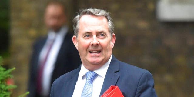 FILE: Britain's International Trade Secretary Liam Fox arrives for a Cabinet meeting at 10 Downing Street in London. 