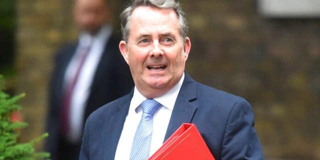 FILE: Britain's International Trade Secretary Liam Fox arrives for a Cabinet meeting at 10 Downing Street in London.