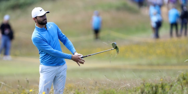 Kyle Stanley of the United States plays out of the rough on the 10th hole during the third round of the British Open Golf Championships at Royal Portrush in Northern Ireland, Saturday. (AP Photo/Peter Morrison)