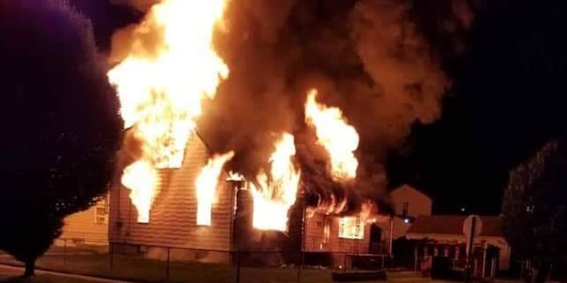 A home under renovation that caught fire in Linden, N.J., on Thursday night. Police are investigating whether or not the blaze is linked to other 'suspicious' fires in the area.