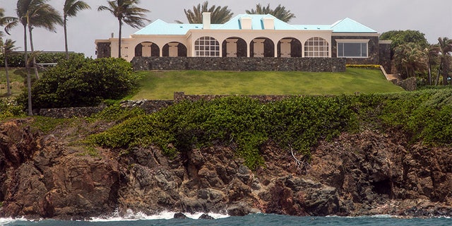 Locals recalled seeing Jeffery Epstein's black helicopter flying back and forth from the international airport in St. Thomas to his helipad on Little St. James Island, where he built a cream-colored mansion with a bright turquoise roof surrounded by several other structures including the maids' quarters and a massive, square-shaped white building on one end of the island that some say is a music room fitted with acoustic walls.