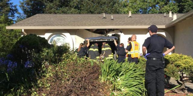Authorities on the scene where a driver crashed his SUV Sunday evening.
