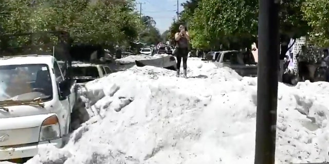 Up to five feet of hail fell from the storm early Sunday, swamping streets across Guadalajara, Mexico.