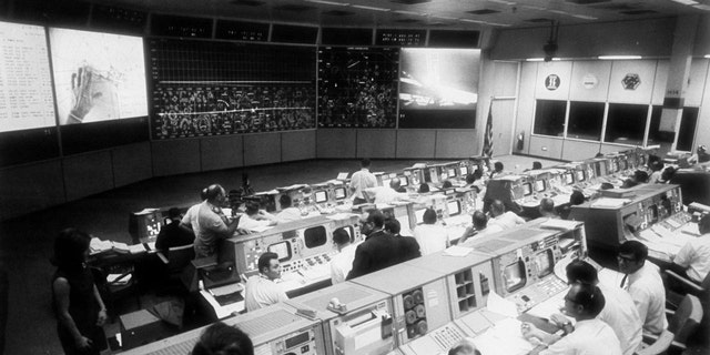 Overall view of the Mission Operations Control Room in the Mission Control Center, bldg 30, during the lunar surface extravehicular activity (EVA) of Apollo 11 Astronauts Neil A. Armstrong and Edwin E. Aldrin Jr. (Credit: NASA)