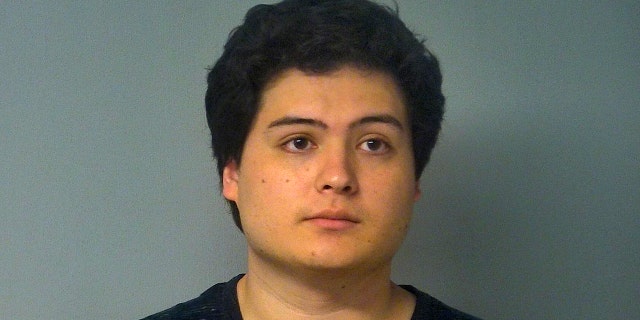 Mitchell Lee Stauffer, 23, charged with trying to intimidate people by burning an American flag in the parking lot of a Virginia Walmart.