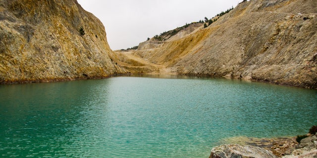 The Instagram-famous, turquoise lake is in fact a chemically contaminated “toxic dump.”