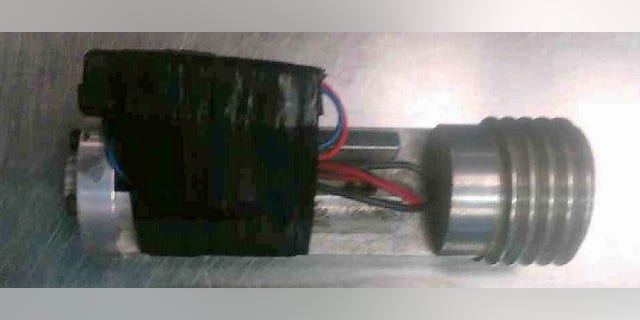 Officials were able to track down the passenger, who explained the bomb-like apparatus was actually a prototype laser for a robot.