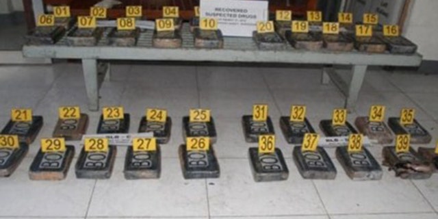 Police present 40 cocaine blocks with a street value of $4.2 million USD during a press conference at Camp Simeon Ola in Legazpi City on Tuesday, May 28, 2019.