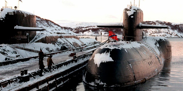 FILE - In this file photo taken on Thursday, Jan. 1, 1998, Decommissioned Russian nuclear submarines are shown in their Arctic base of Severomorsk, the Kola Peninsula, Russia. (AP Photo)