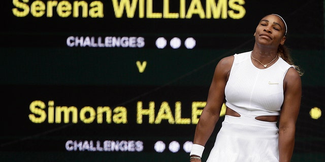 United States' Serena Williams reacts after losing a point to Romania's Simona Halep during the women's singles final match on day twelve of the Wimbledon Tennis Championships in London, Saturday, July 13, 2019. (AP Photo/Tim Ireland)