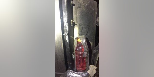 Longmont police pulled over a man in Colorado after they spotted a red sports drink where his tail light should've been .