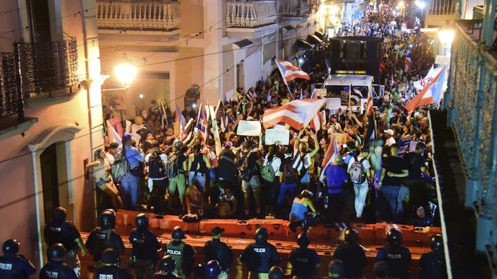 Puerto Rican governor defiant amid resignation demands