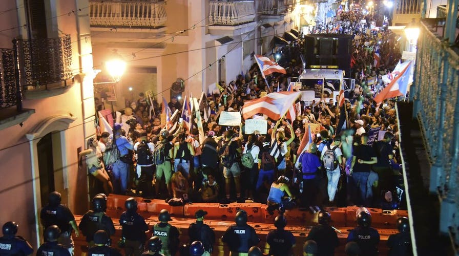 Puerto Rican governor defiant amid resignation demands