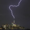 Lightning strikes One World Trade Center during a thunderstorm in New York City, July 17, 2019.