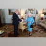 Britain's Queen Elizabeth II welcomes newly elected leader of the Conservative party Boris Johnson during an audience at Buckingham Palace where she invited him to become Prime Minister in London, July 24, 2019. 
