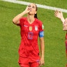 Alex Morgan of the U.S. pretends to sip tea as she celebrates scoring their second goal with teammate Rose Lavelle in Lyon, France, July 2, 2019. 