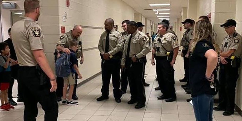 Georgia deputies walk son of fallen deputy to first day of fourth grade